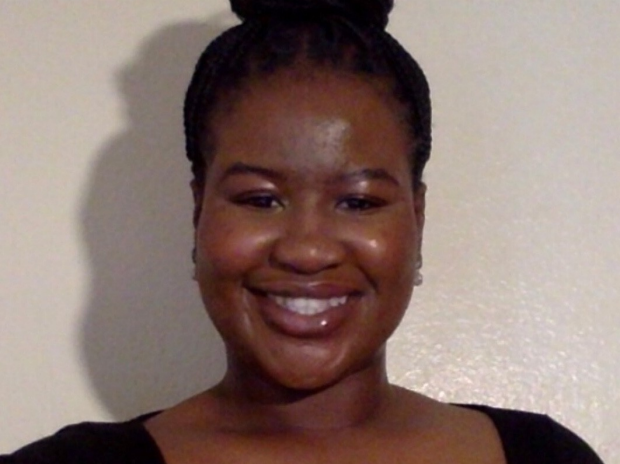 smiling headshot of Courtney Obasohan