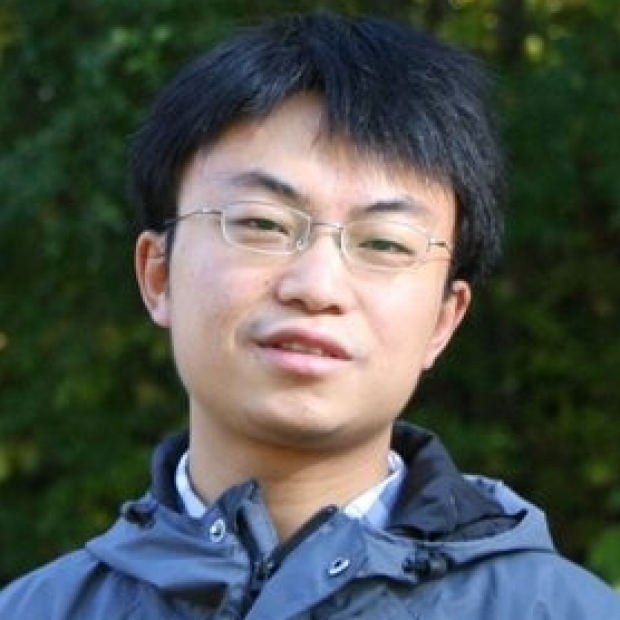 smiling head shot of Qing Liu, PhD