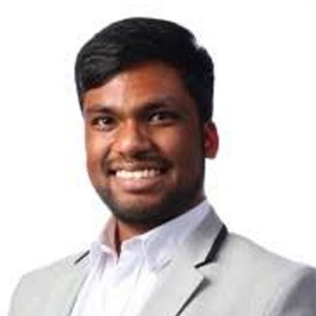 smiling headshot of Anojan Selvalingam