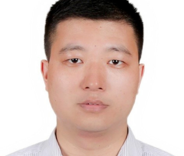 headshot of Tiejun Zhang